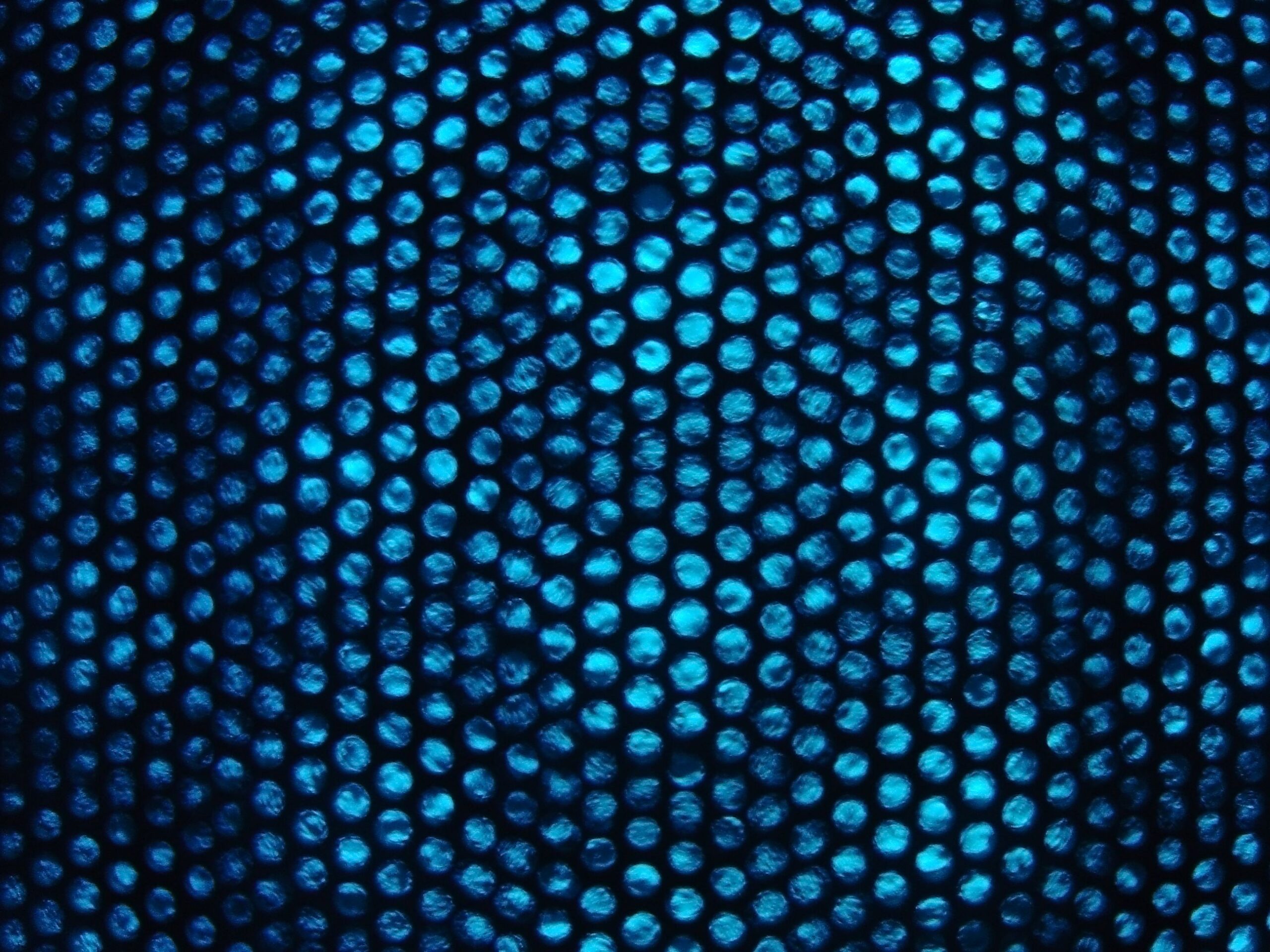 Scattered dots with uneven spacing, showing reduced density and limited availability in a system.