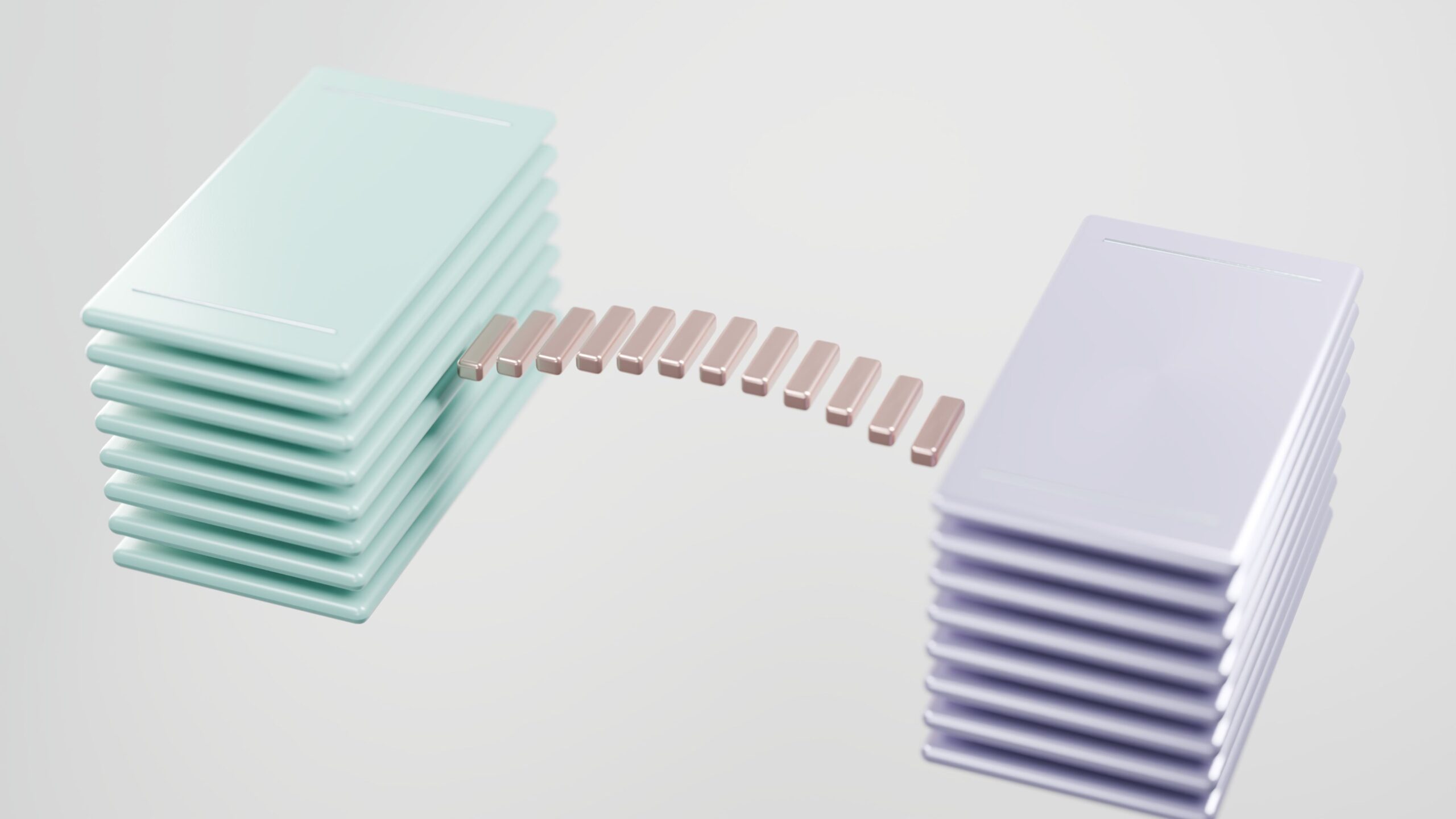 Abstract image of overlapping sheets transitioning from one color into another between two stacks.